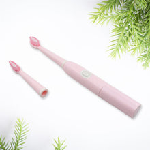 Compact electric toothbrush with extra brush head