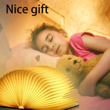 Piglet-shaped lamp with book light functionality and color options