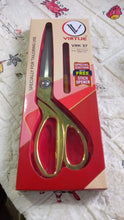 Top view of 9.5-inch scissors highlighting the cutting edge and design.