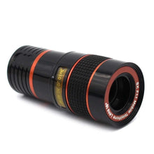 Phone camera lens with 8X zoom and clip attachment.