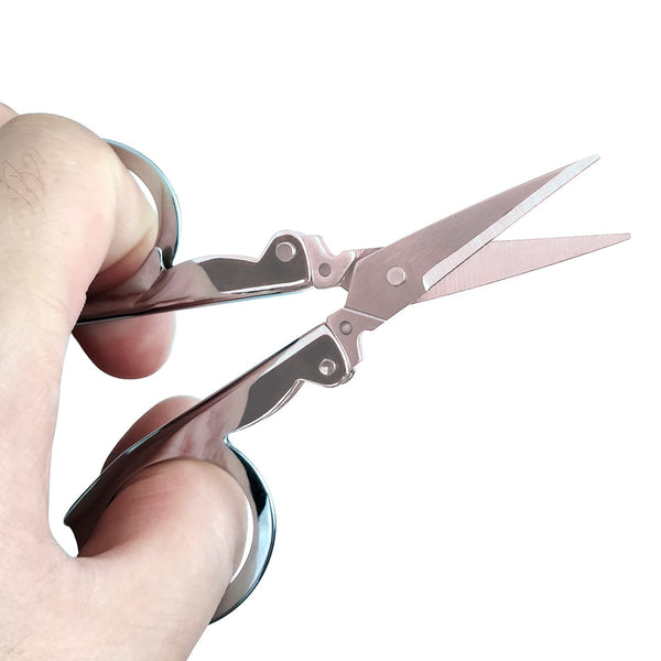 Folding scissors for cutting tasks