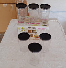 Round kitchen containers for dry food storage.